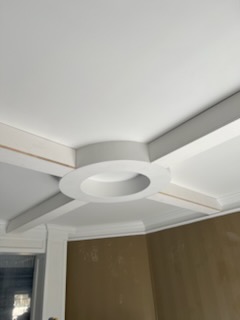 Crown molding and coffered ceiling detail