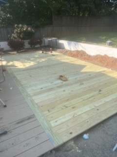 New pressure-treated deck built by Porter Carpentry in Atlanta