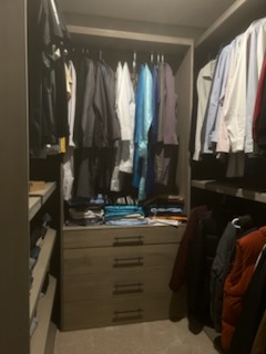 Custom walk-in closet with built-in drawers